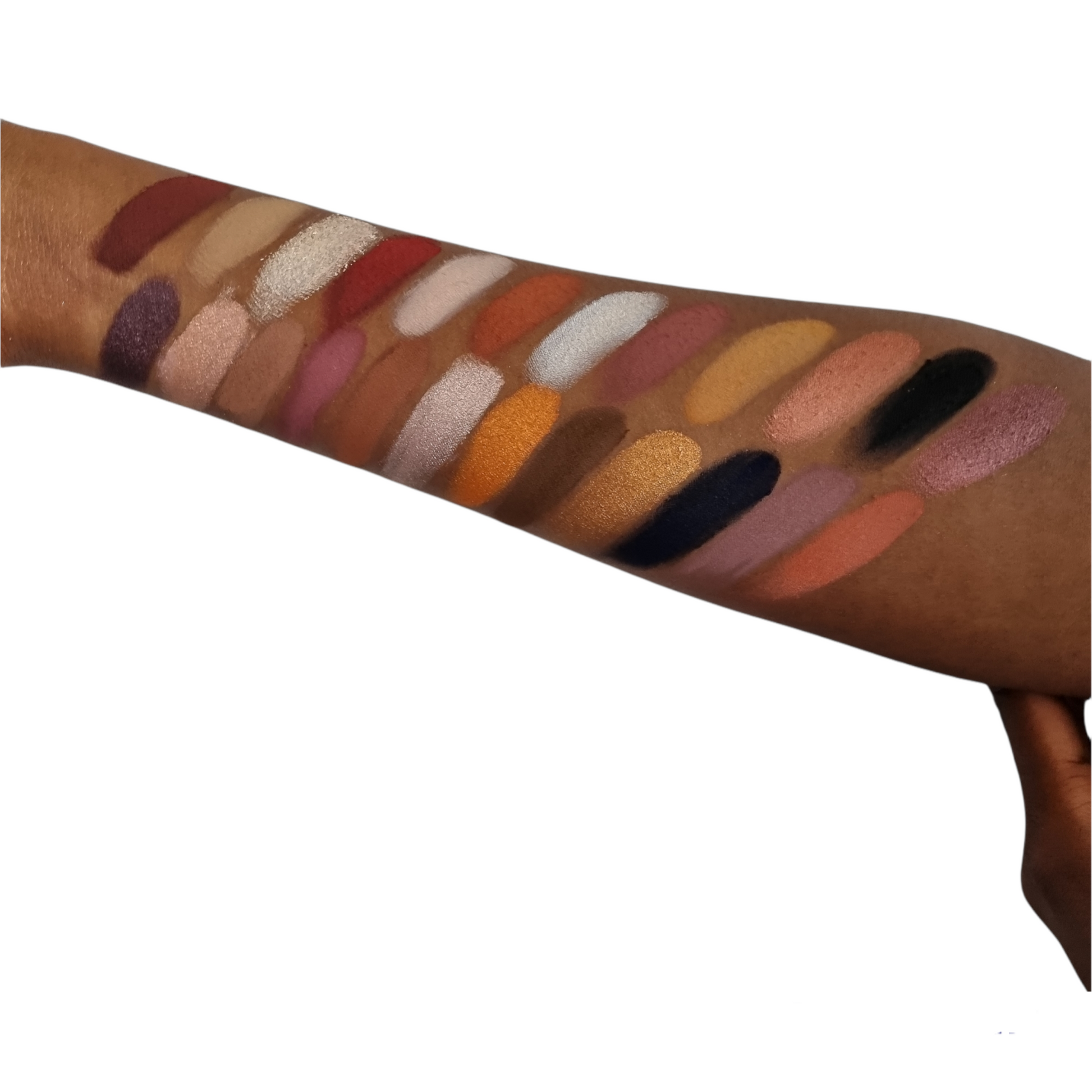 SKIN jigsaw puzzle eyeshadow palette arm swatches on brown blackskin