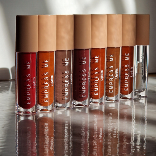 Lip plumping lip gloss by empress me. Lip gloss for brown girls. Fall autumn lip gloss